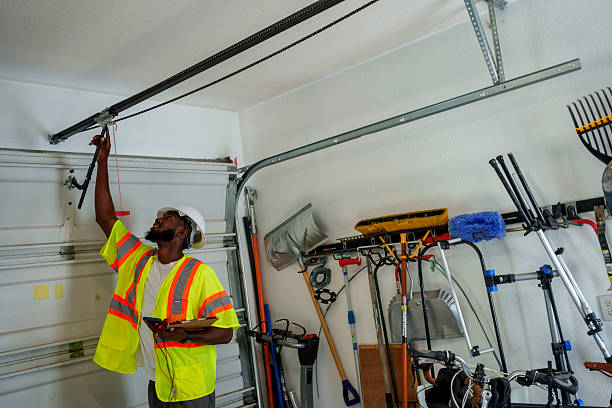 Professional Garage Door Repair technician working in North Pembroke, MA